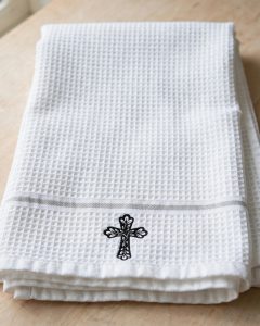 Leaf Cutout Cross Machine Embroidery Design embroidered on a towel