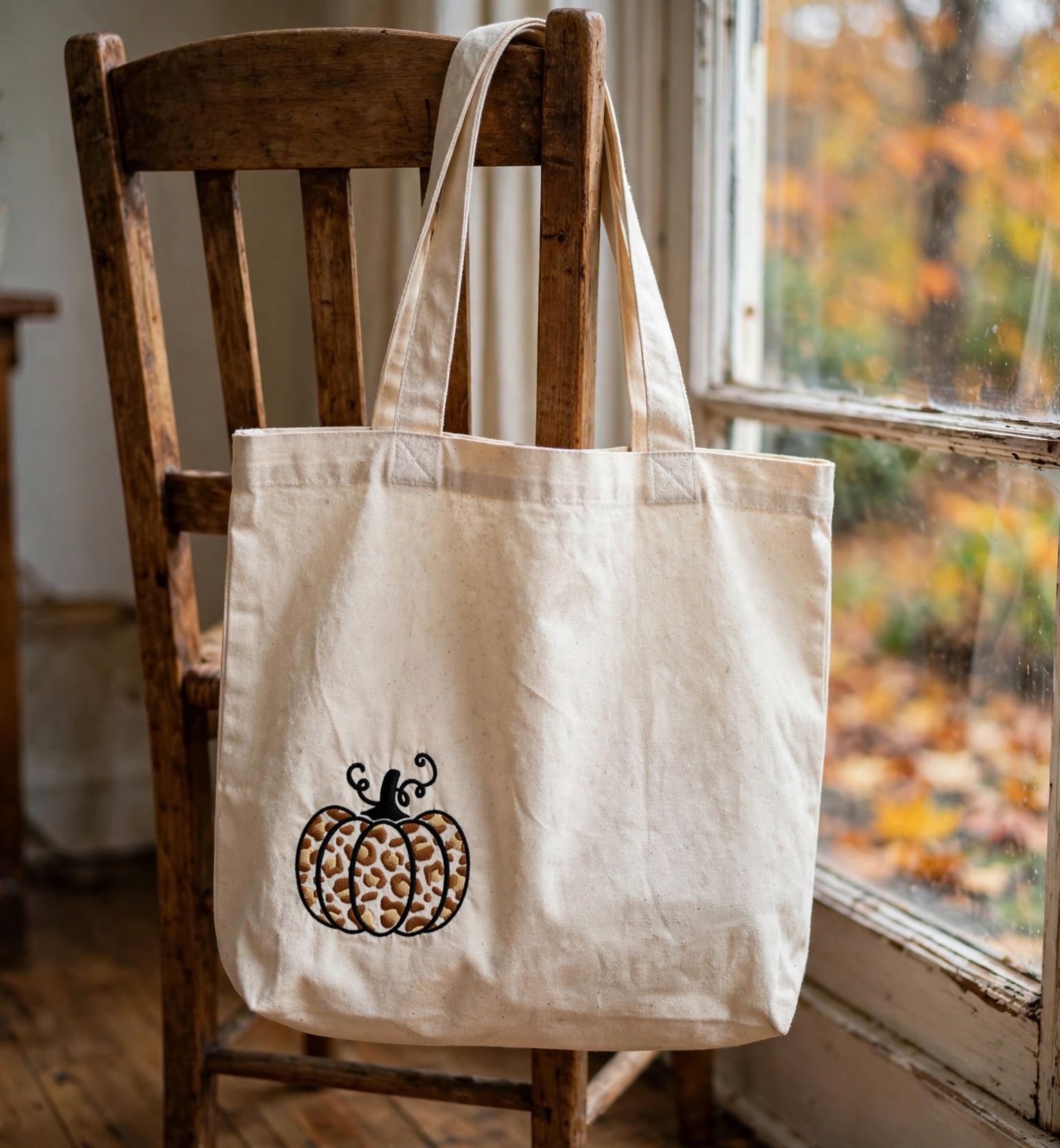 Leopard Print Pumpkin Machine Embroidery Design embroidered on a tote bag