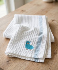Llama Machine Embroidery Design embroidered on a towel