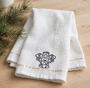 Swirly Angel Machine Embroidery Design embroidered on a towel